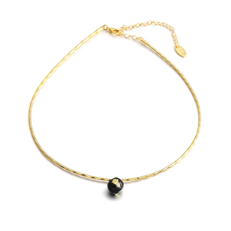 Women's vintage gold crackle statement necklace with unique texture.