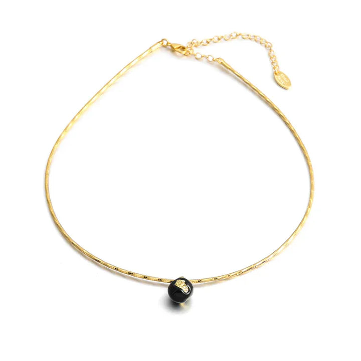 Women's vintage gold crackle statement necklace with unique texture.