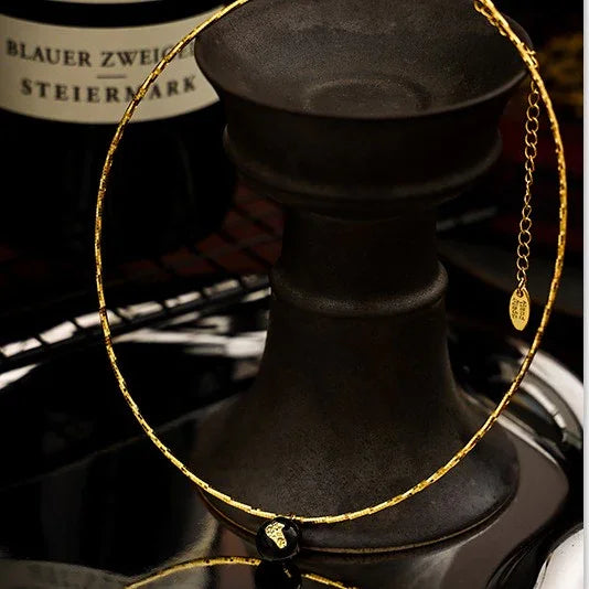 Bold vintage gold crackle statement necklace for women, a unique and eye-catching jewelry accessory.