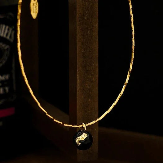 Luxurious women's vintage gold crackle necklace, featuring a distinctive textured gold finish.