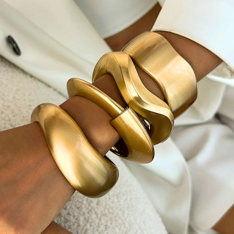 Women's vintage gold cuff bracelet set, brushed metal, organic design for a stylish accessory.