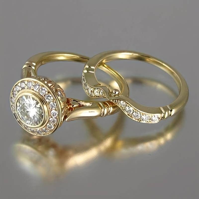 Women's vintage gold plated ring set with sparkling zirconia stones, a perfect fashion jewelry accessory.