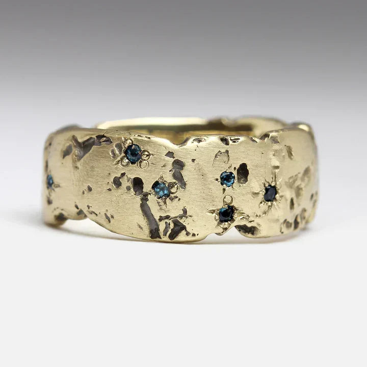 Women's vintage gold ring with a striking blue inlaid crystal, perfect as a fashion or statement jewelry gift.