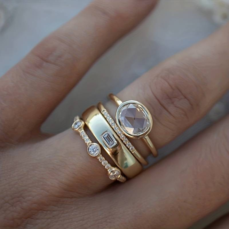 Women's vintage gold & zirconia stackable ring set. Dainty fashion accessory, perfect gift for her.