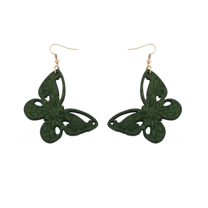 Handmade green carved wood earrings for women; vintage style dangle jewelry, unique fashion accessory.
