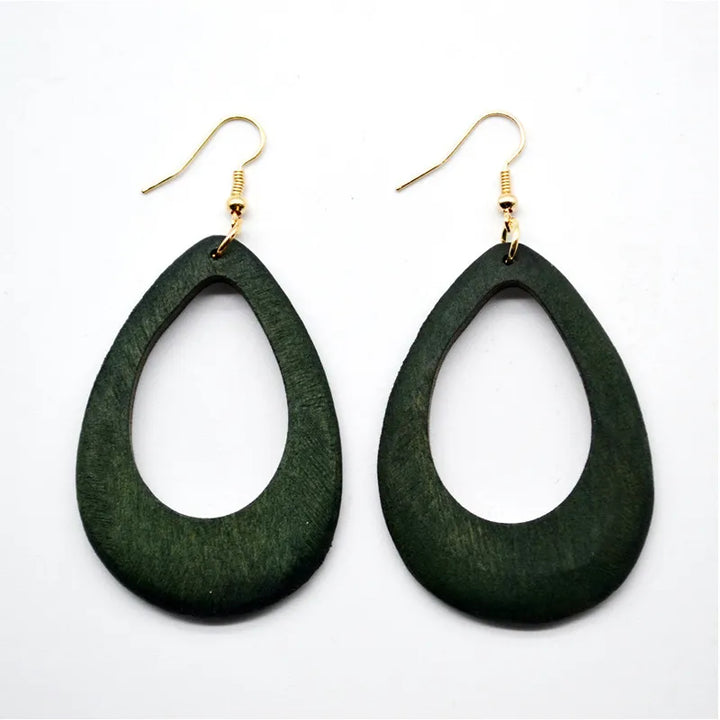 Elegant vintage green carved wooden earrings; unique handmade eco-friendly dangle jewelry for women.