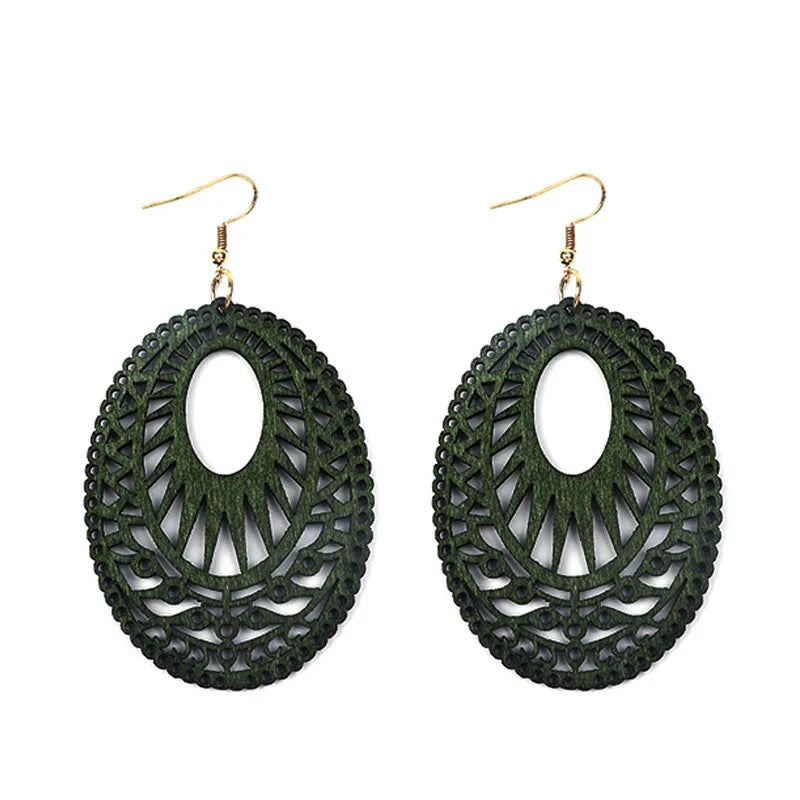 Distinctive green carved wooden dangle earrings; vintage handmade jewelry for women, eco-friendly accessory.