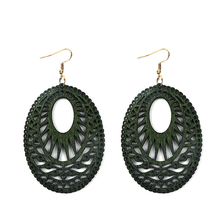 Distinctive green carved wooden dangle earrings; vintage handmade jewelry for women, eco-friendly accessory.