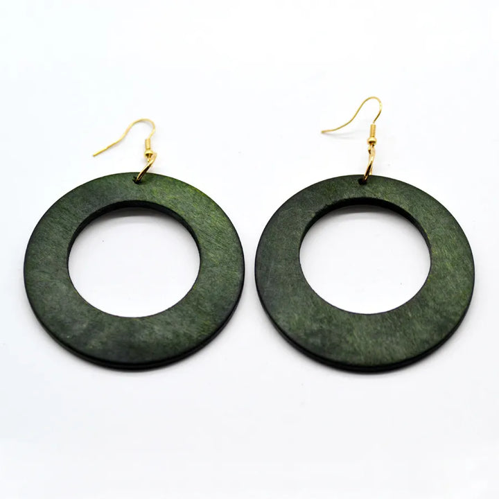 Stylish green carved wood dangle earrings; handmade vintage jewelry for women, unique and eco-friendly.