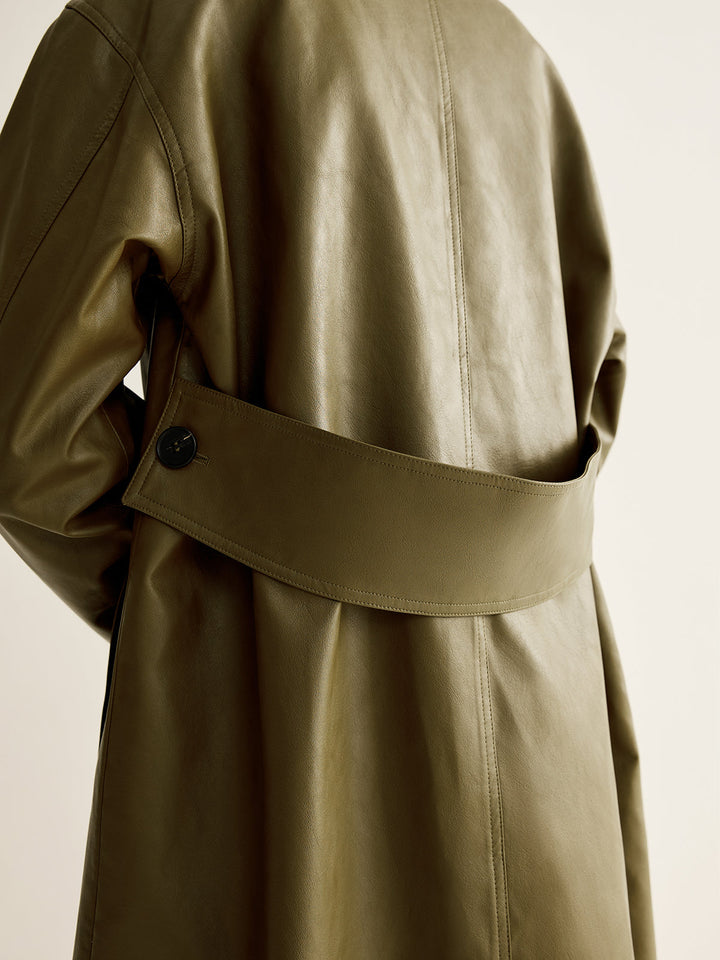 Elegant women's vintage green longline leather jacket, an oversized yet timeless piece for any wardrobe.