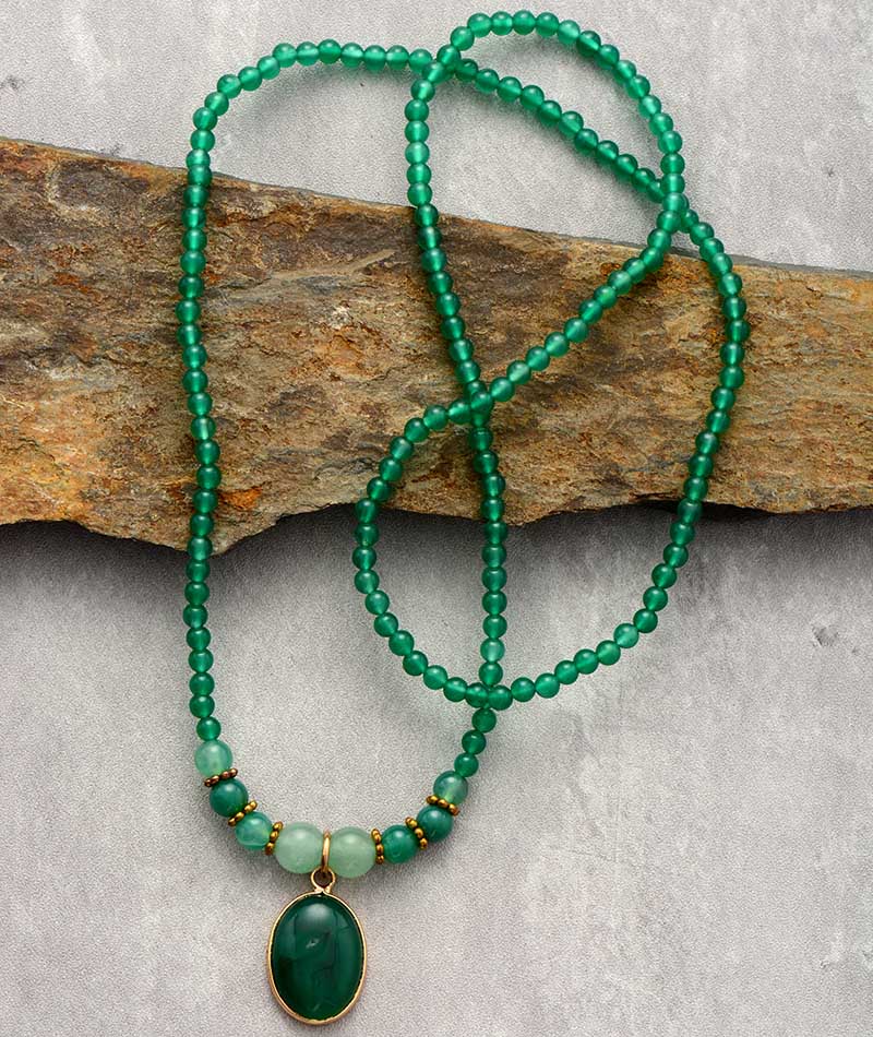 Elegant vintage green onyx necklace, a unique healing jewelry piece with a calming gemstone for women.