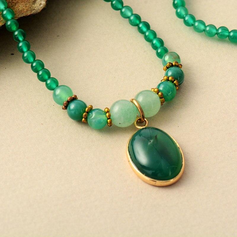 Versatile women's vintage green onyx necklace, a handcrafted gemstone charm for daily wear & spiritual well-being.
