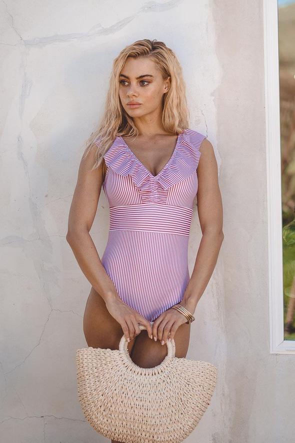 Elegant women's retro one-piece swimsuit, featuring a unique vintage print. Summer swimwear.