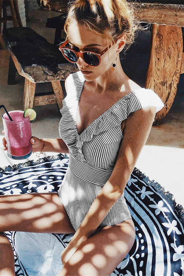 Retro printed one-piece swimsuit, women's vintage beachwear. Elegant and comfortable for summer.