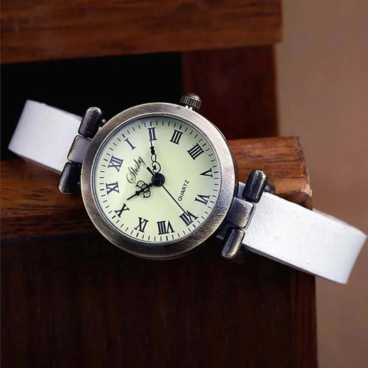 Timeless women's accessory: a vintage-inspired quartz watch with a durable leather strap.