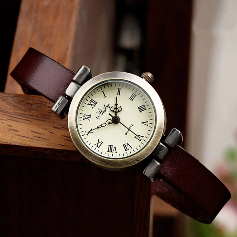 Stylish women's fashion accessory: a classic quartz watch with a refined leather band.