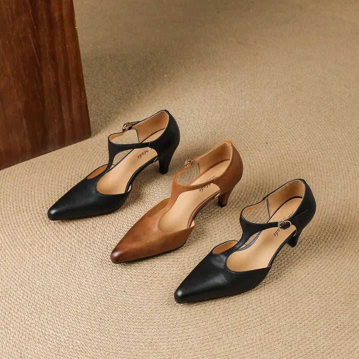 Women's vintage T-strap heels on foot, demonstrating elegant fit, comfort, and classic formal style.