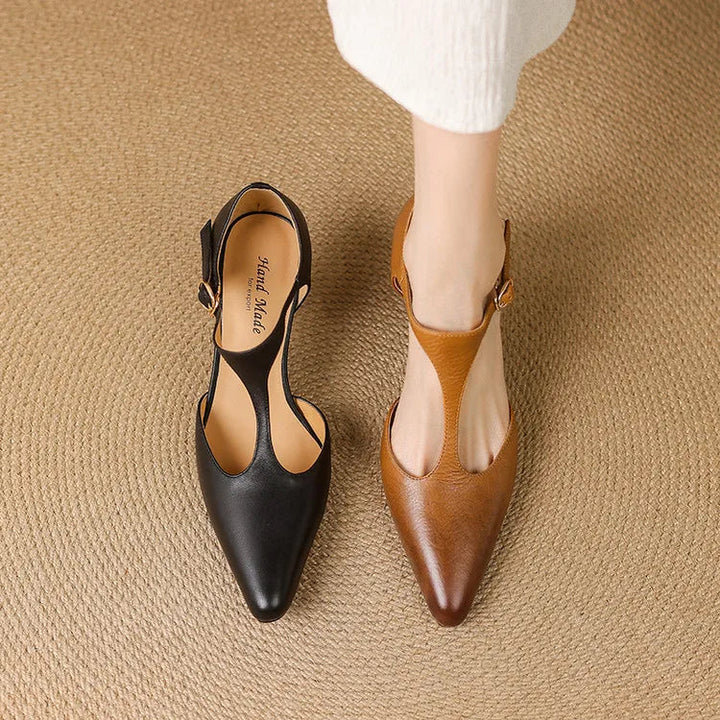Vintage-inspired T-strap heels for women in elegant black, a classic choice for formal and dress events.