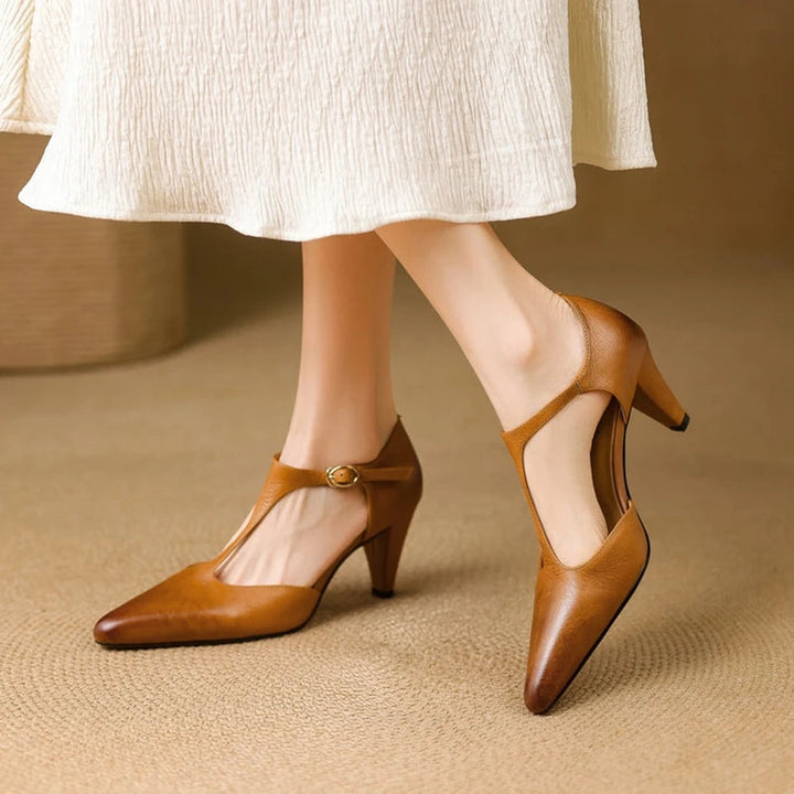 Elegant brown vintage T-strap heels for women, comfortable and versatile for dressy events.