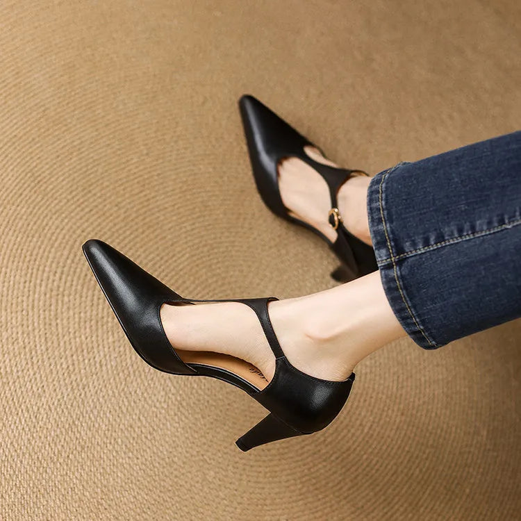 Side view of women's black vintage T-strap heels, highlighting the elegant design and comfortable fit.