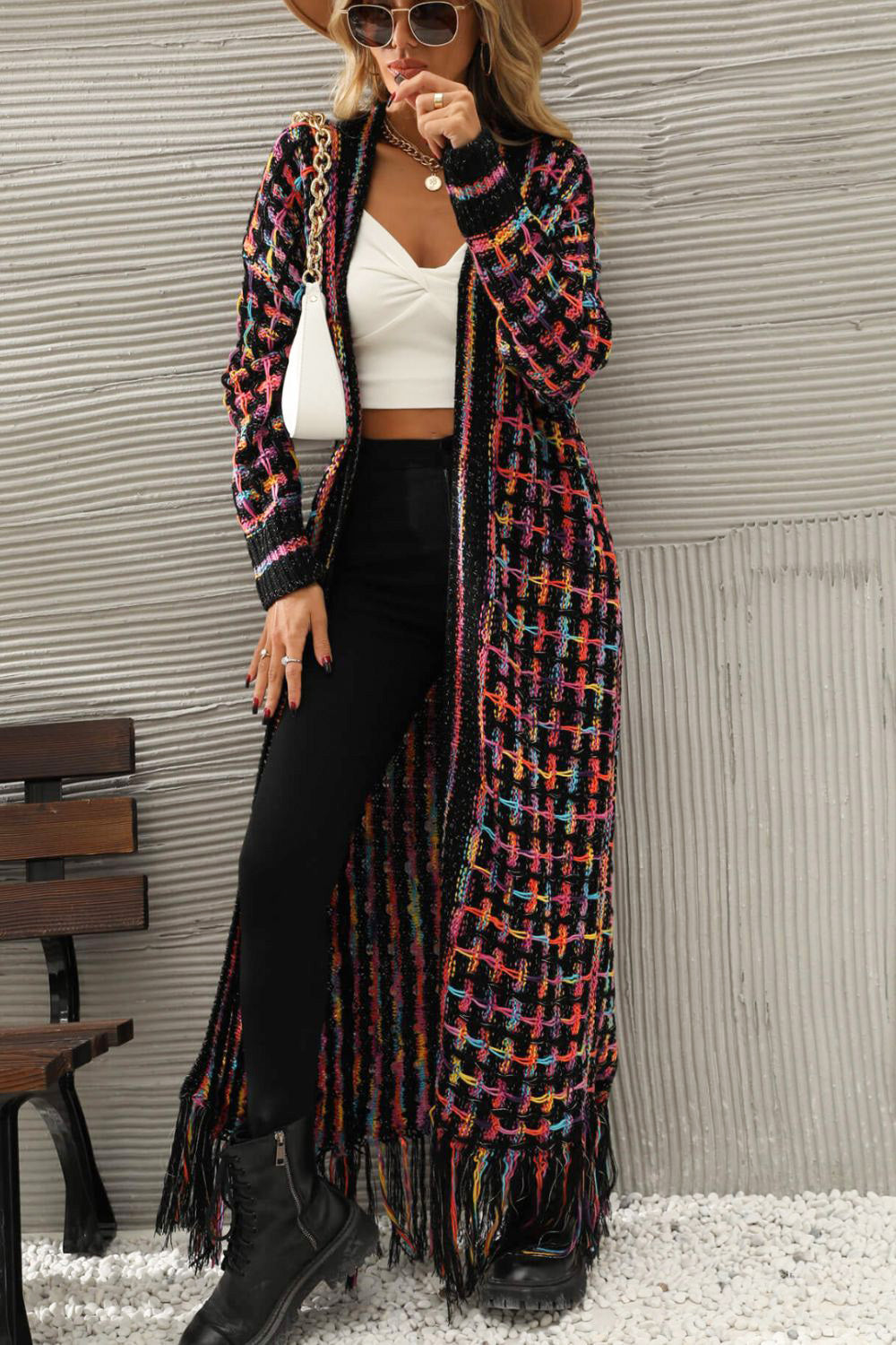 Cozy women's oversized vintage long cardigan sweater. Warm knitwear, ideal for winter fashion and casual chic.