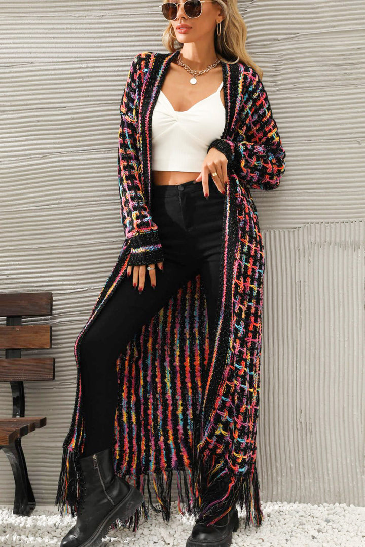 Stylish women's vintage long cardigan sweater. Soft knit, perfect layering piece for cool weather and casual outfits.