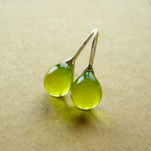 Women's vintage olive glass drop earrings. Elegant handmade retro jewelry with unique style.
