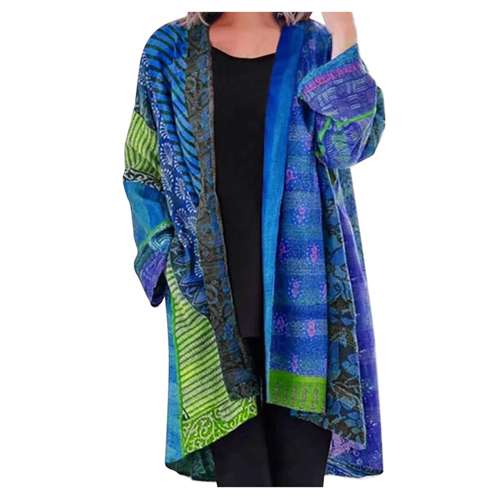 Women's vintage oversized long sweater with front pocket. Cozy, relaxed fit for everyday fall essential fashion.