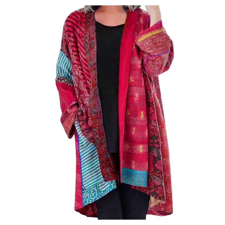 Relaxed fit women's vintage long sweater featuring a practical front pocket. Ideal for casual everyday wear.