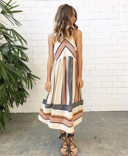 Retro-style women's sleeveless A-line dress in a vibrant summer print, ideal for casual fashion.