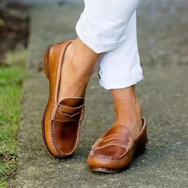 Chic women's PU leather vintage slip-on loafers. Round toe flats offer comfortable, easy-to-wear everyday style.