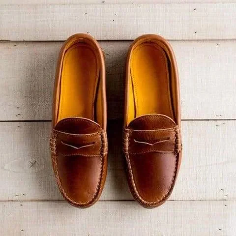 Classic women's low heel loafers, slip-on design for ultimate comfort. Versatile vintage footwear for all seasons.