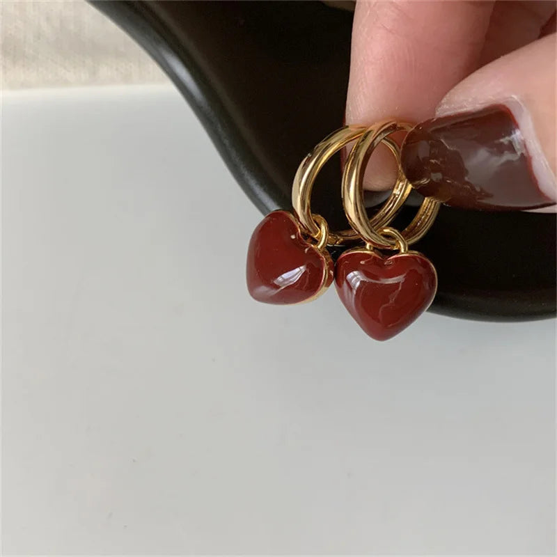 Women's vintage split heart drop earrings, gold plated. Elegant fashion jewelry, perfect gift for her.