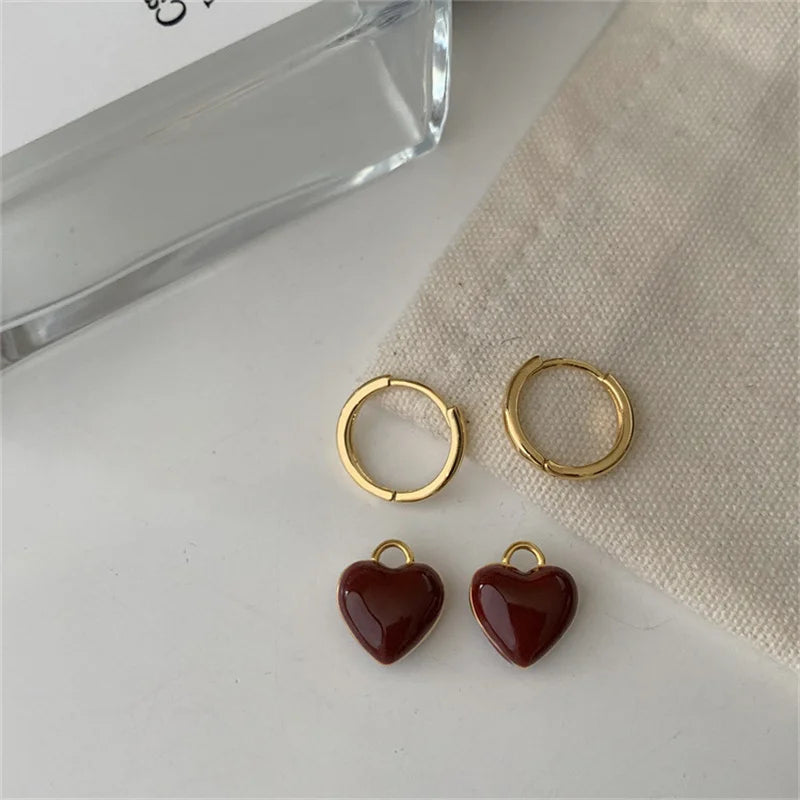 Chic gold plated women's vintage split heart drop earrings. Fashionable and romantic heart jewelry for her.