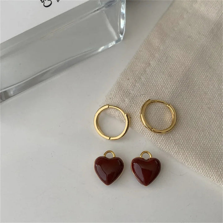 Chic gold plated women's vintage split heart drop earrings. Fashionable and romantic heart jewelry for her.