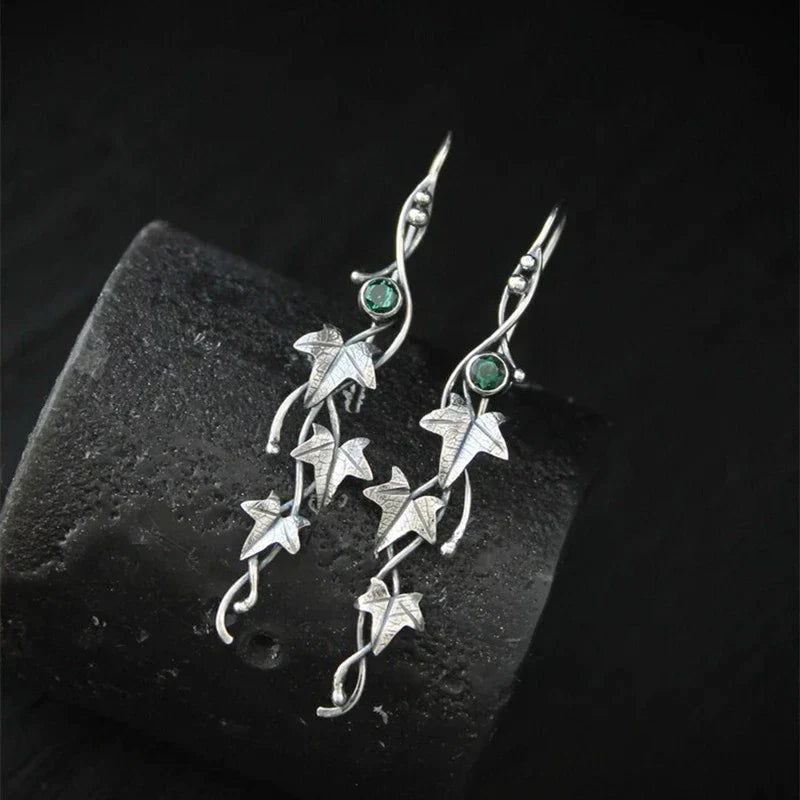 Vintage leaf dangle earrings crafted from sterling silver, a timeless piece of women's jewelry.