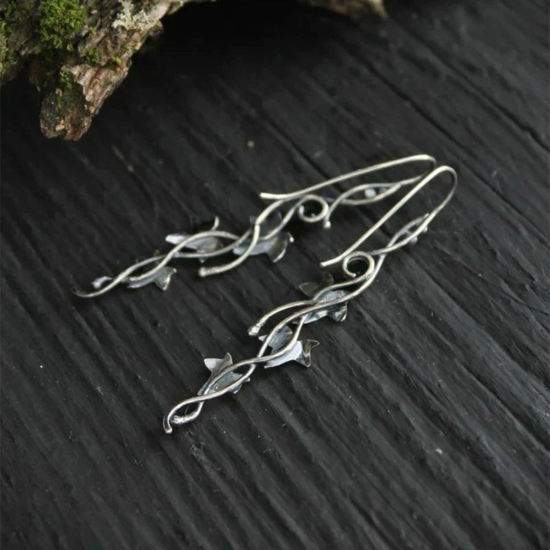 Stunning women's vintage sterling silver leaf dangle earrings, exquisite and elegant.