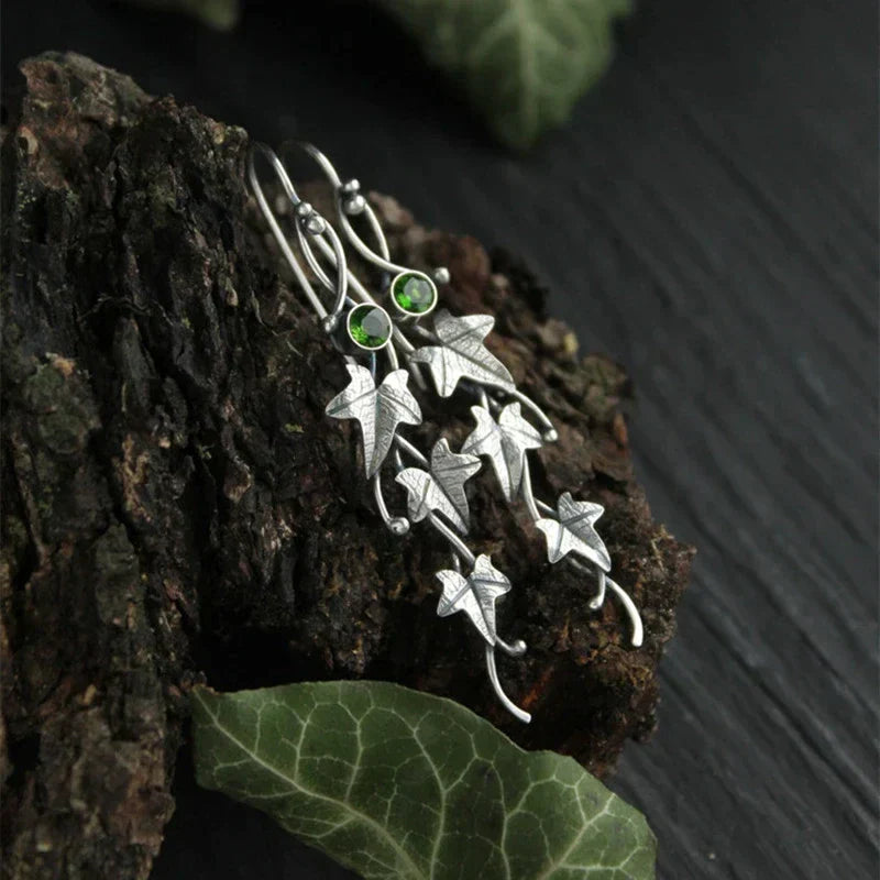 Delicate vintage leaf sterling silver dangle earrings for women, adding an elegant touch.