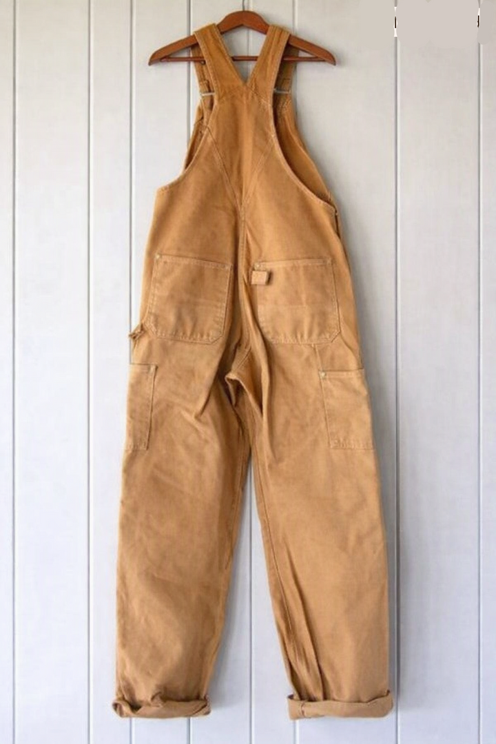 Relaxed fit women's vintage-style overalls with adjustable shoulder straps and utility pockets.