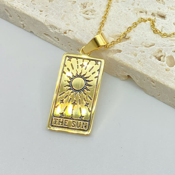 Women's vintage tarot card pendant, detailed mystical necklace design.