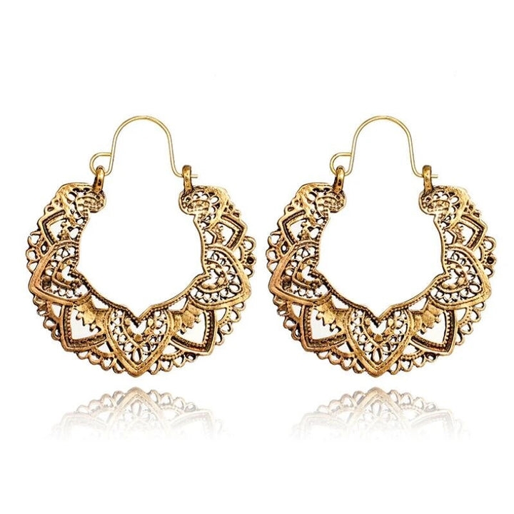 Distinctive vintage totem drop earrings. Women's unique style fashion jewelry, perfect gold/silver accessory.