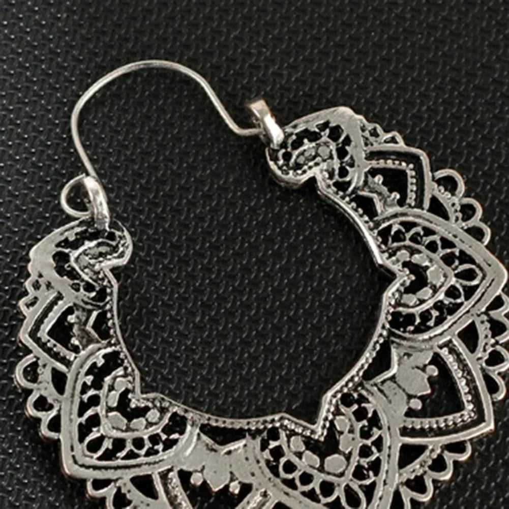 Elegant vintage totem drop earrings, a unique gold & silver gift. Women's statement fashion jewelry.