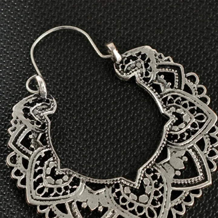 Elegant vintage totem drop earrings, a unique gold & silver gift. Women's statement fashion jewelry.