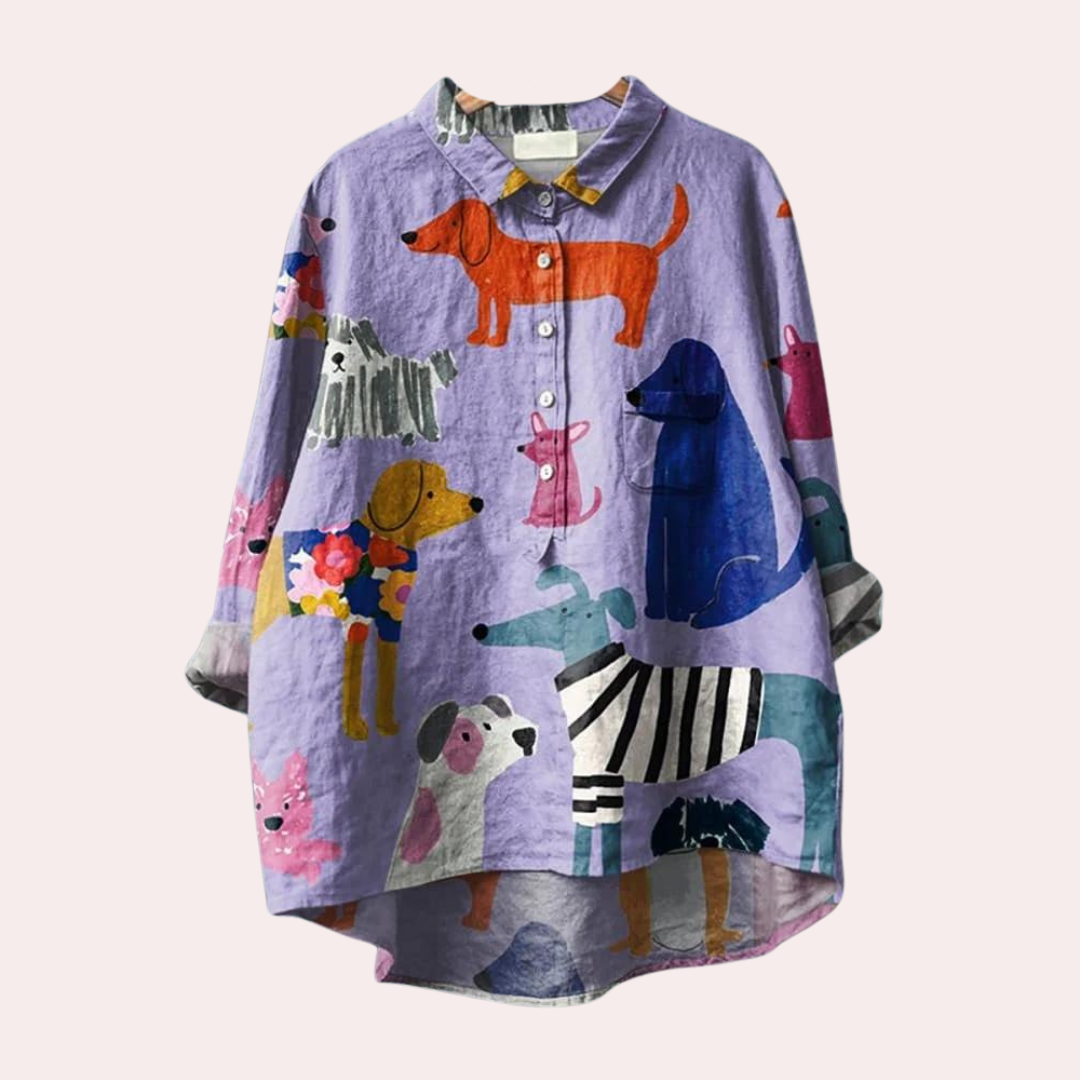 Women's violet artistic dog print shirt for casual wear. Joyful and trendy graphic tee for animal lovers.