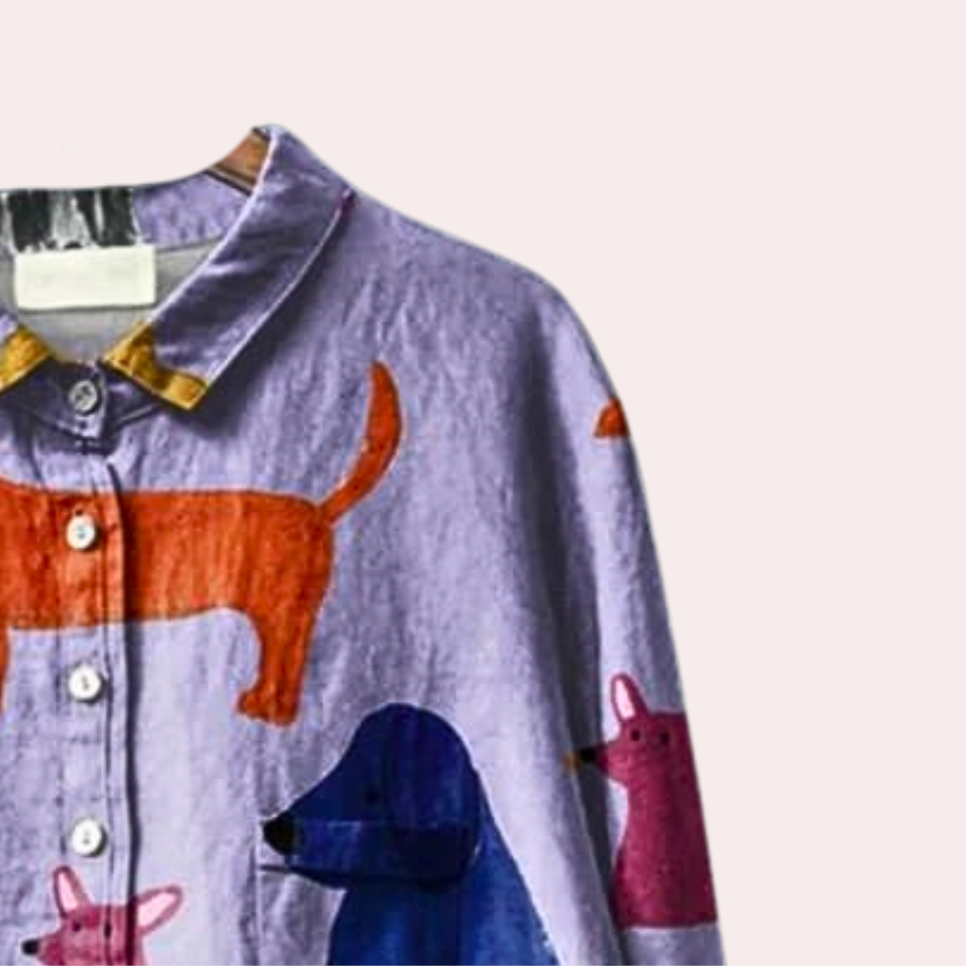 Comfortable women's artistic dog print shirt. Unique graphic tee in violet, perfect for trendy casual fashion.