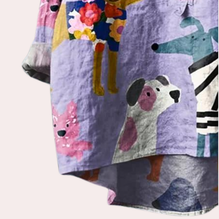 Joyful women's violet shirt with artistic dog print. A unique graphic tee for animal lovers, perfect for casual style.