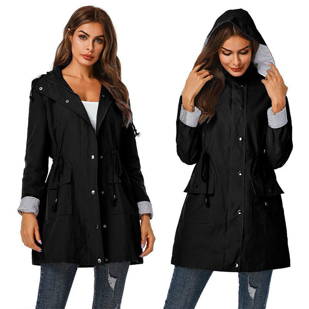 Viviane women's lightweight hooded windbreaker jacket with adjustable waist, perfect travel gear for changing weather.