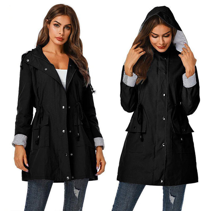 Viviane women's lightweight hooded windbreaker jacket with adjustable waist, perfect travel gear for changing weather.