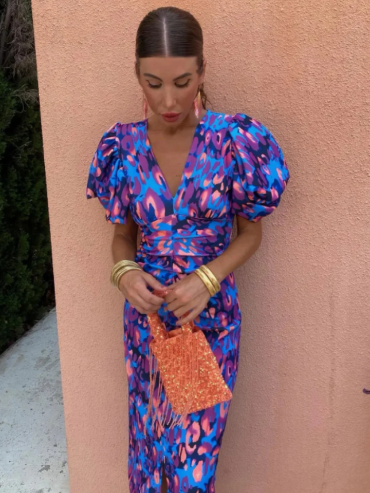 Statement vivid ruched midi dress for women, with bold sculpted shoulders. A perfect party & wedding guest outfit.