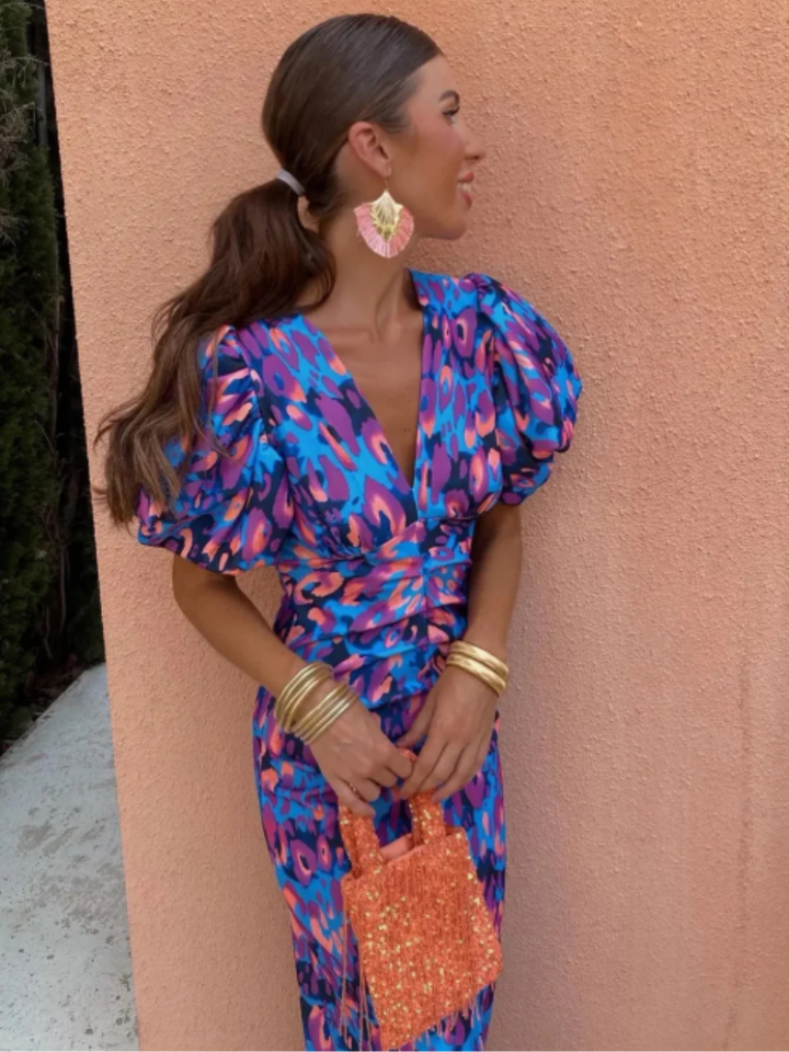 Elegant women's ruched midi dress in a vivid hue, with sculpted shoulders. Great for evening parties & events.
